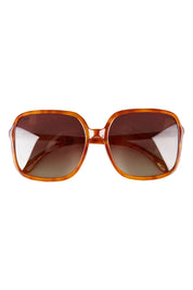 Product shot of the Della Spiga Sunglasses in colour Vintage, from the front