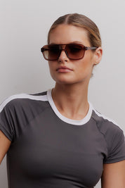Product shot of the Runway Sunglasses - Mocca in colour Mocca, from the front