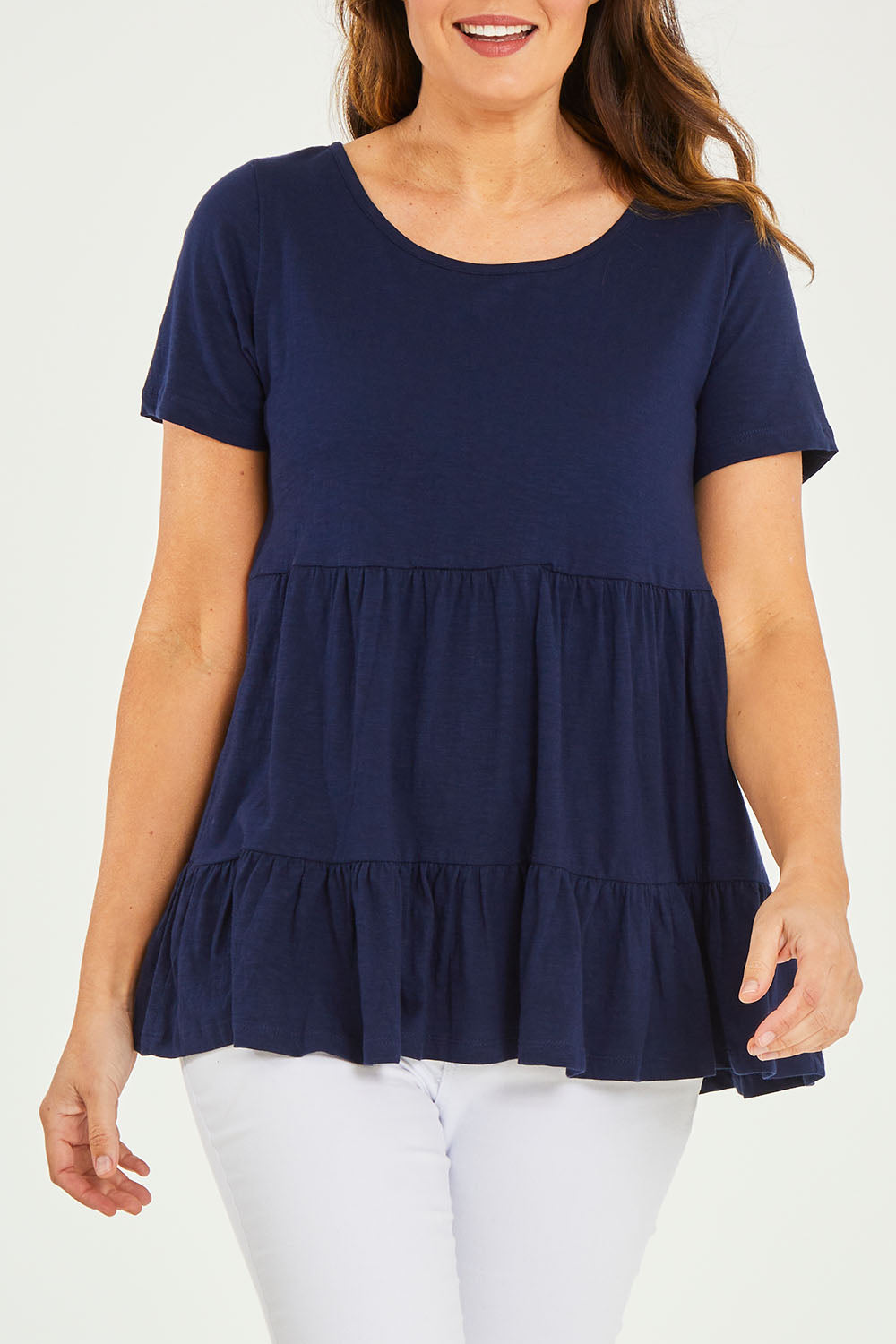 Model Georgia wearing size 10 of the Harper Layered Top in colour Navy (Blue), from the front, cropped image