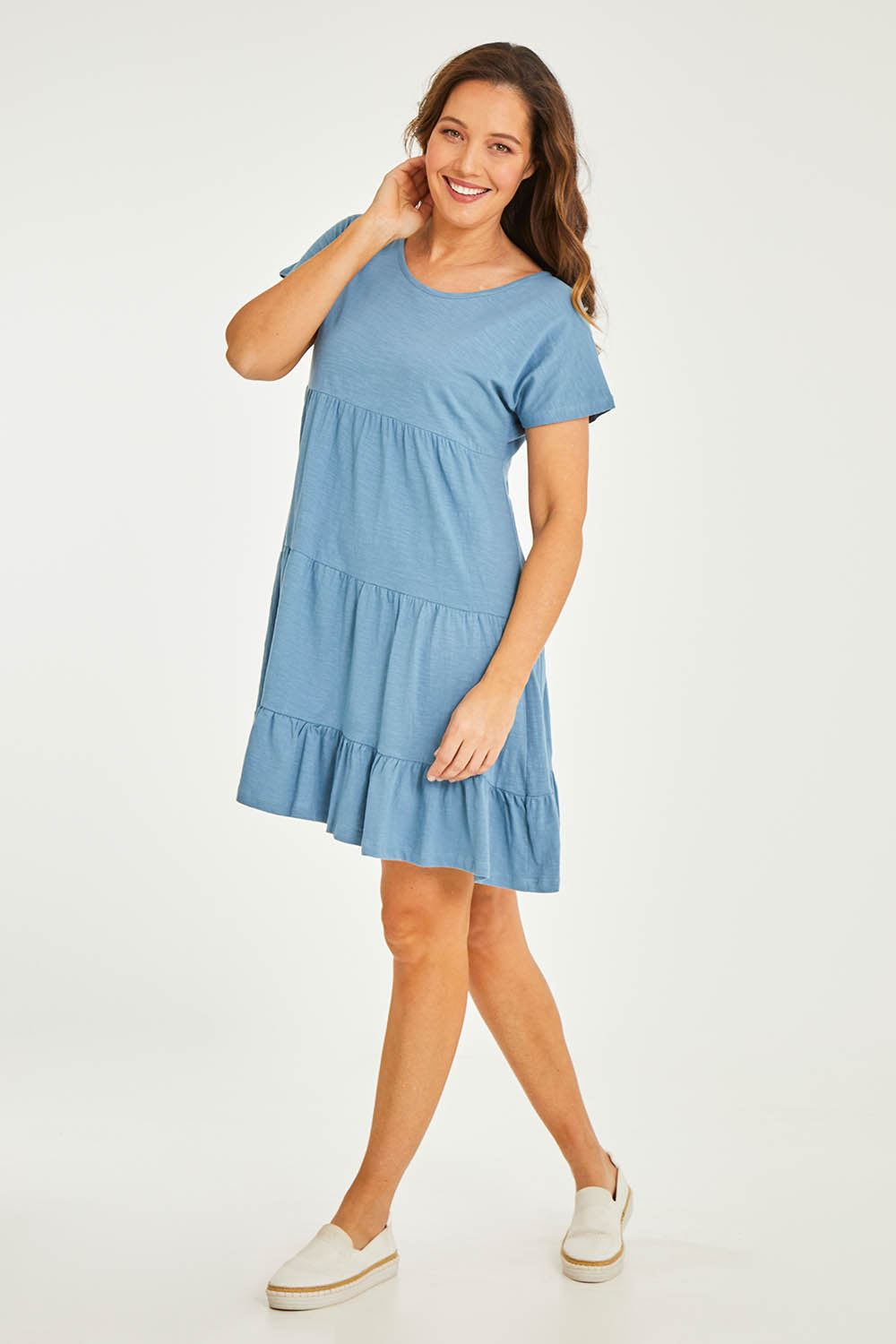 Model Georgia wearing size 10 of the Audrey Layered Dress in colour Denim (Blue), from the front, showing the whole outfit