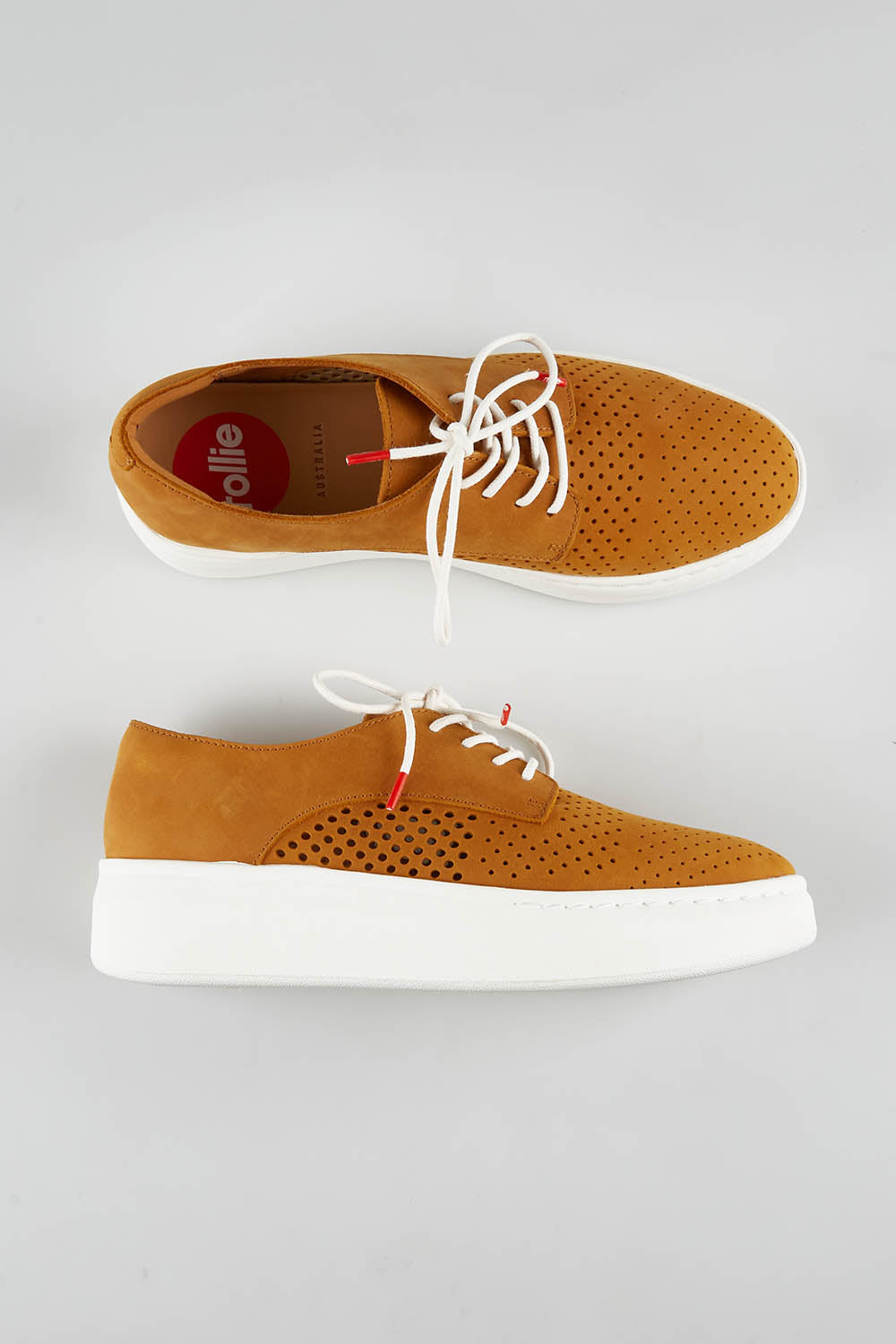 A model wearing size 37 of the Derby City Punch in colour Rustictan, from the front, showing the whole outfit