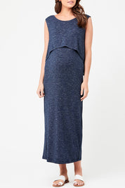 A model wearing the Swing Back Nursing Maternity Maxi Dress in colour Denim (Blue), from the front, cropped image