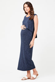 A model wearing the Swing Back Nursing Maternity Maxi Dress in colour Denim (Blue), from the front, showing the whole outfit