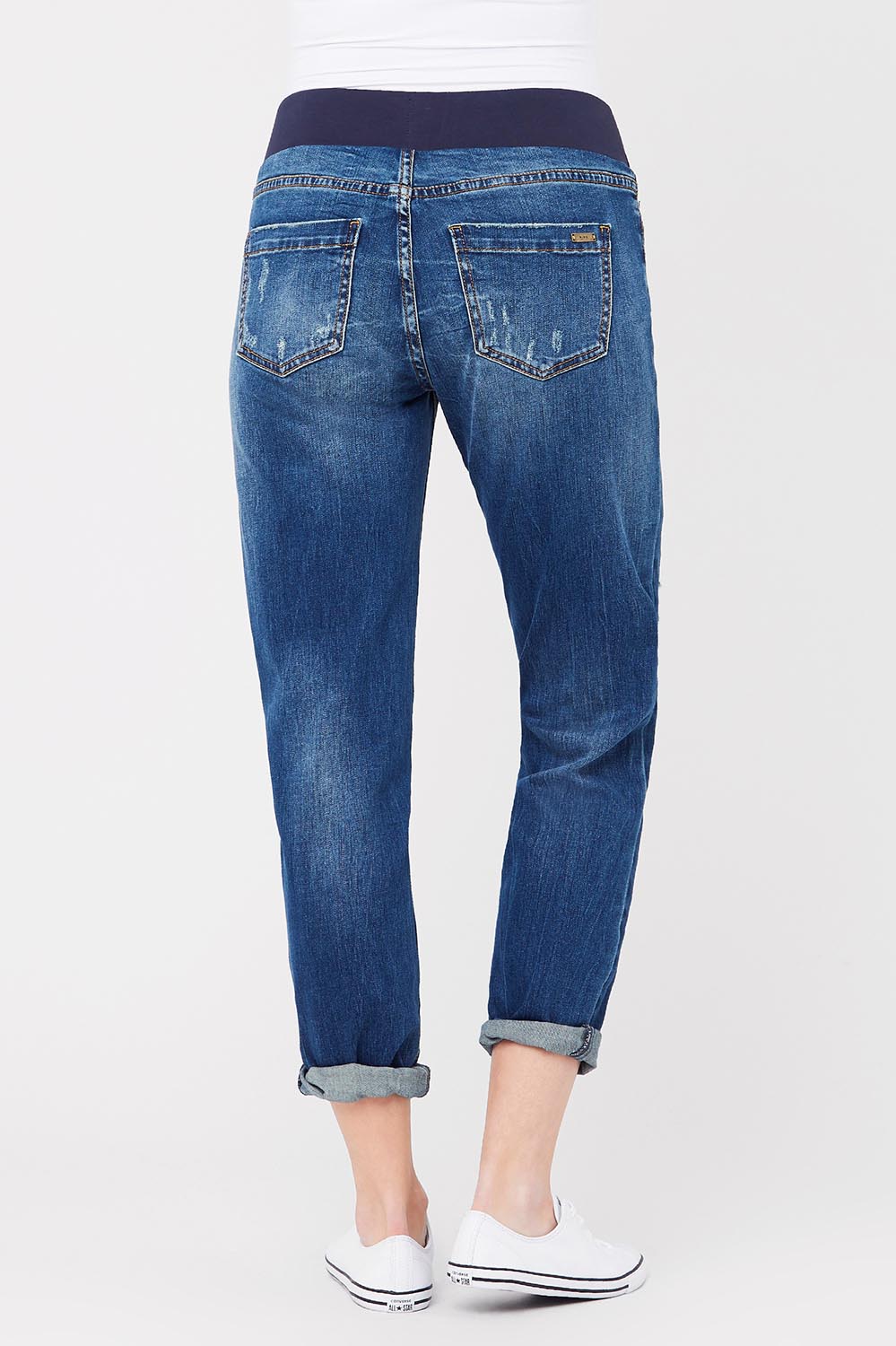 A model wearing the Baxter Boyfriend Jean in colour Indigofade (Blue), from the back