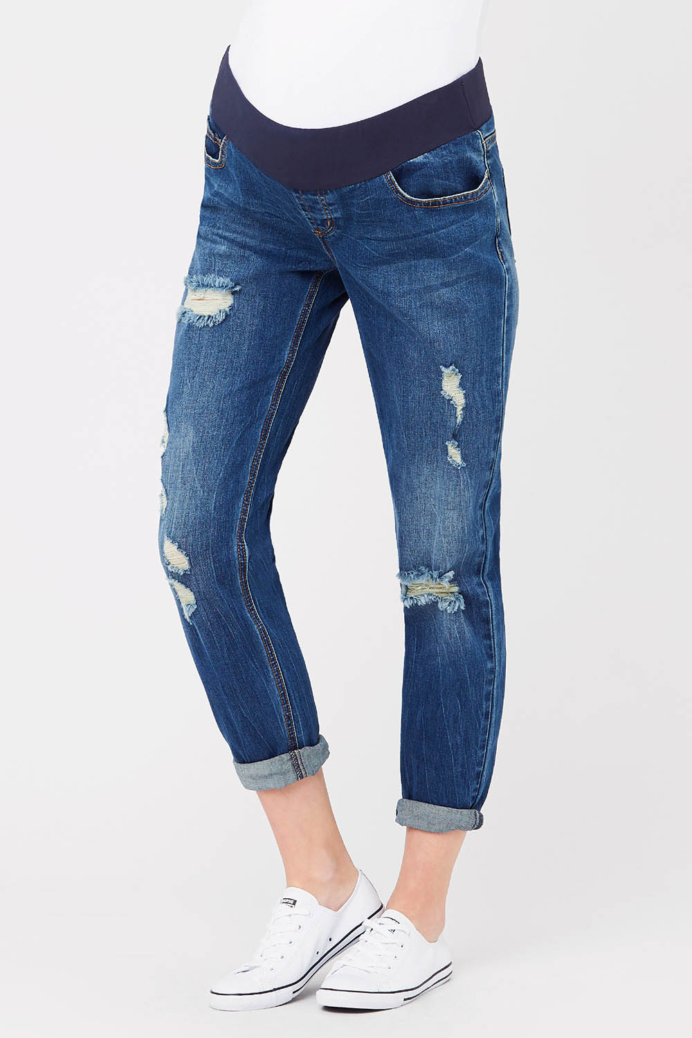 A model wearing the Baxter Boyfriend Jean in colour Indigofade (Blue), from the front, cropped image