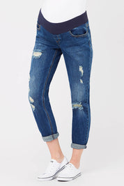 A model wearing the Baxter Boyfriend Jean in colour Indigofade (Blue), from the front, cropped image
