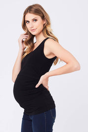 A model wearing the Ali Up Down Nursing Maternity Tank in colour Black (Black), from the front, cropped image