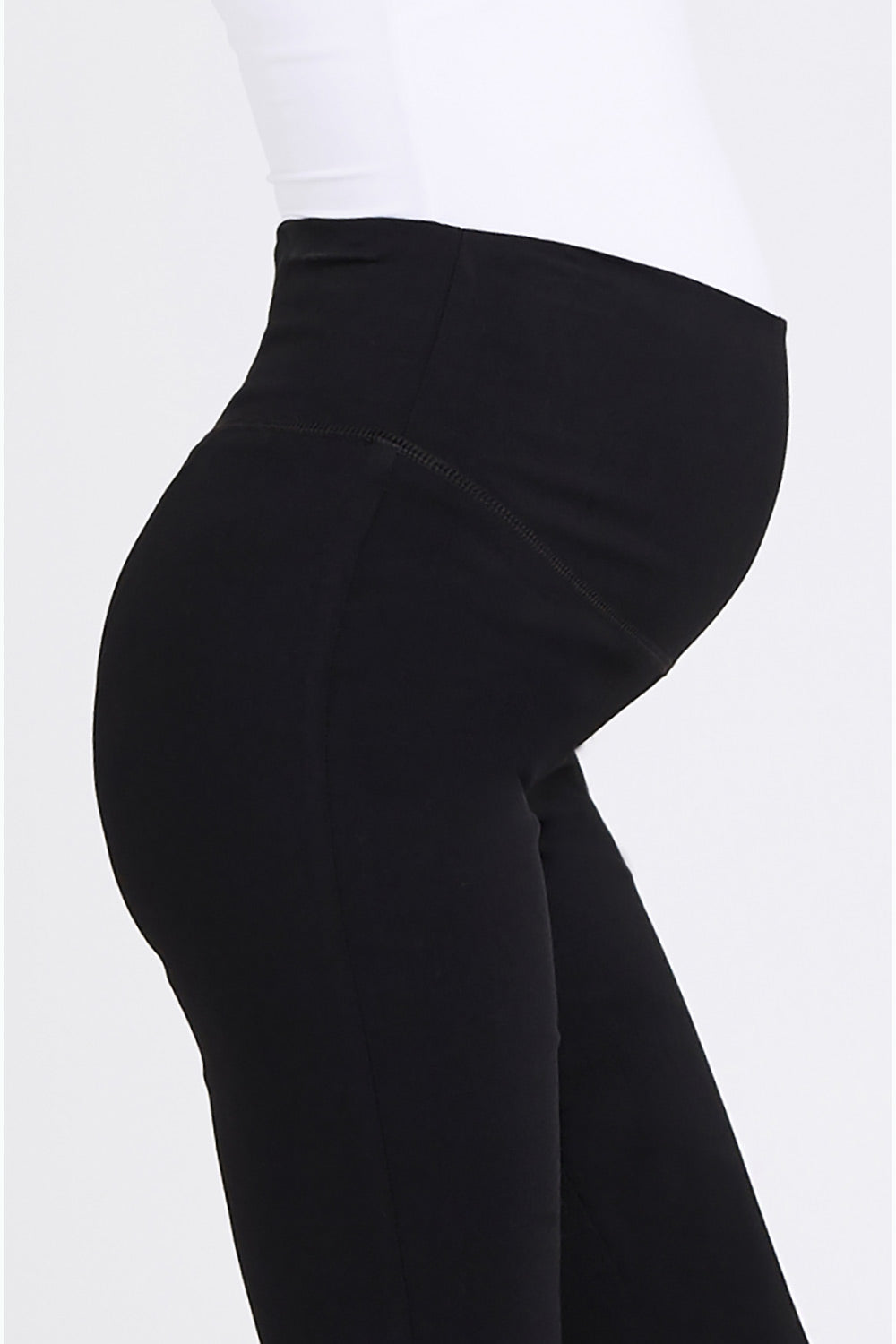 A model wearing the Suzie Maternity Super Straight Pant in colour Black (Black), from the front, cropped image