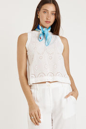 A model wearing the Agay Cotton Top in colour White (White), from the front, cropped image