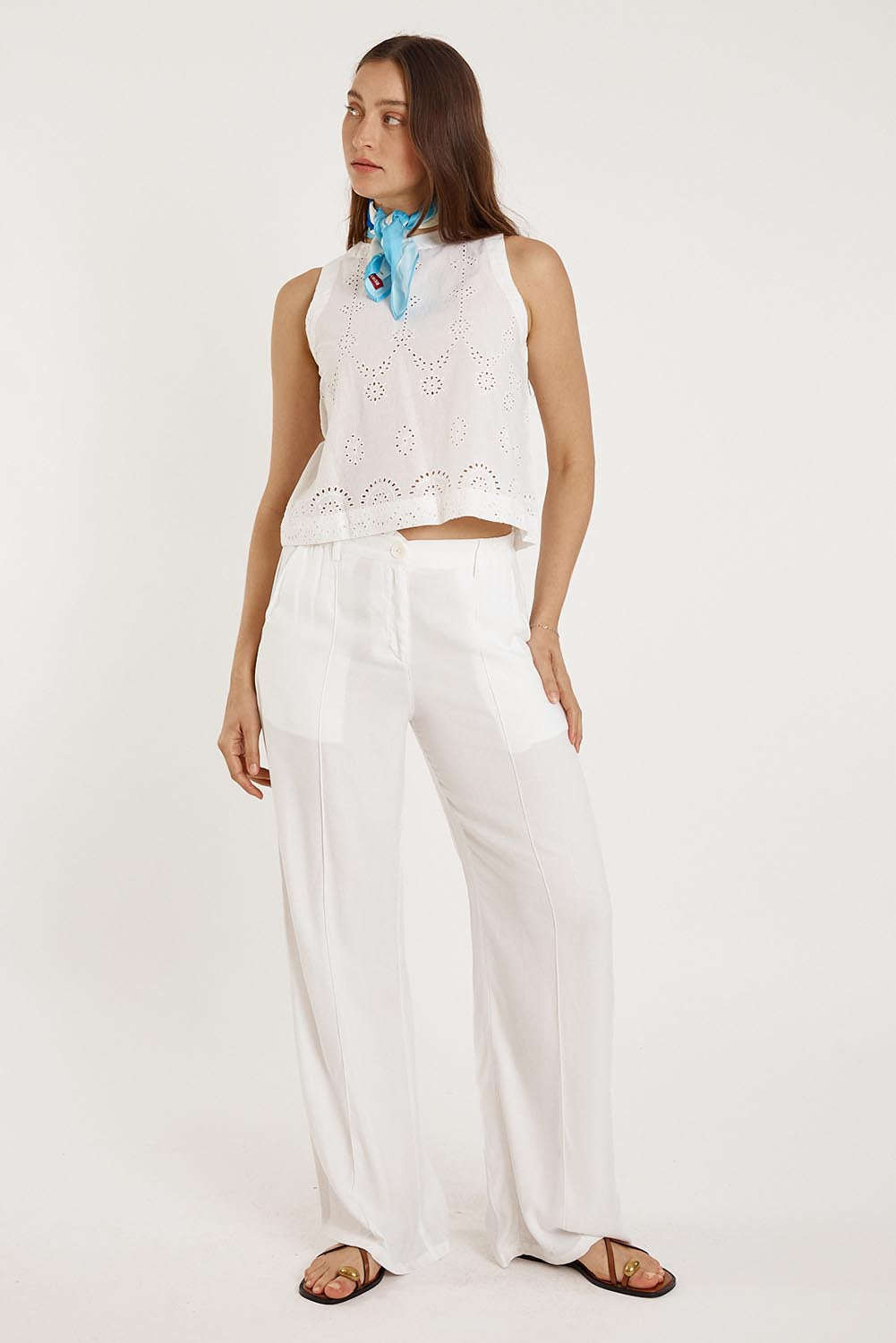 A model wearing the Agay Cotton Top in colour White (White), from the front, showing the whole outfit