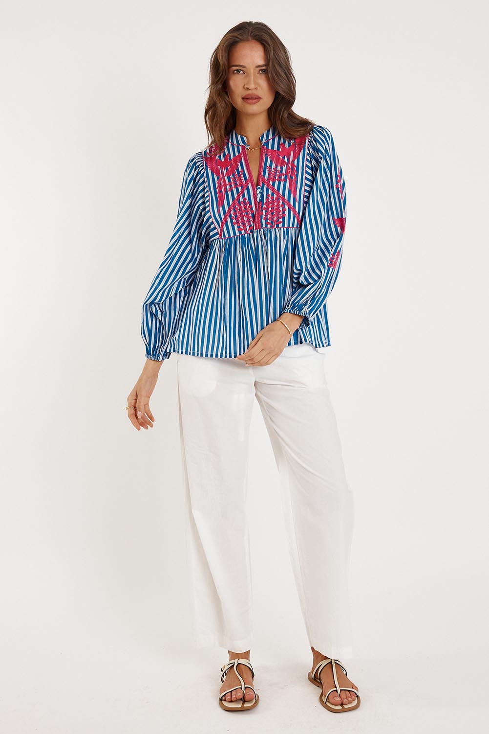 A model wearing the Antibes Cotton Shirt in colour Blue (Blue), from the front, showing the whole outfit