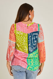 Model Georgia wearing size S of the Bandana Shirt in colour Print (Blue), from the back