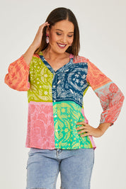 Model Georgia wearing size S of the Bandana Shirt in colour Print (Blue), from the front, cropped image