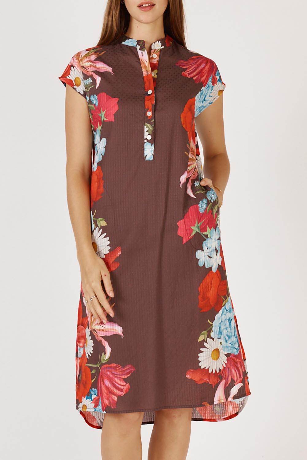 A model wearing the Bharita Cotton Dress in colour Print, from the front, cropped image