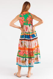 A model wearing the Blooming Patch Cotton Maxi Dress in colour Multi, from the back