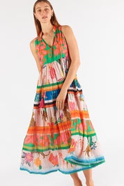 A model wearing the Blooming Patch Cotton Maxi Dress in colour Multi, from the front, showing the whole outfit