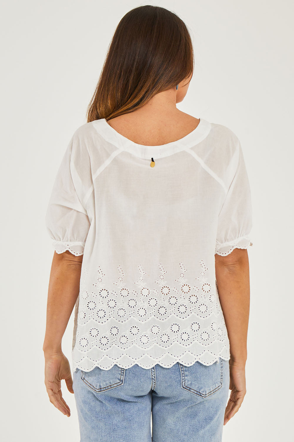 Model Georgia wearing size S of the Bronte Top in colour White (White), from the back