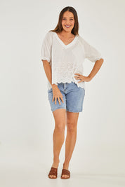 Model Georgia wearing size S of the Bronte Top in colour White (White), from the front, showing the whole outfit