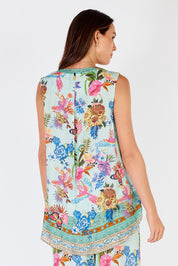 A model wearing the Caatinga Top in colour Mint (Green), from the back