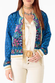 A model wearing the Camilla Jacket in colour Blue (Blue), from the front, cropped image