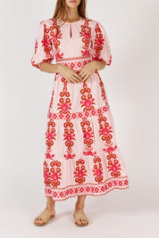 A model wearing the Carlos Cotton Maxi Dress in colour Pink (Pink), from the front, cropped image