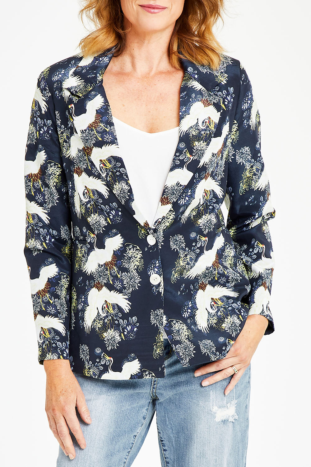 Model Naomi wearing size S of the Carlotta Jacket in colour Navy (Blue), from the front, cropped image