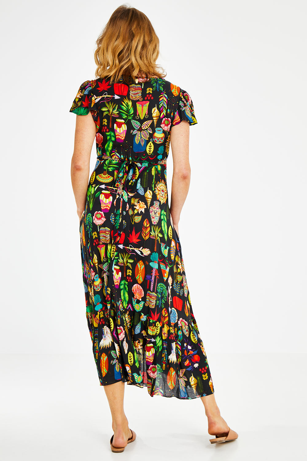 Model Naomi wearing size S of the Crawford Wrap in colour Black (Black), from the back