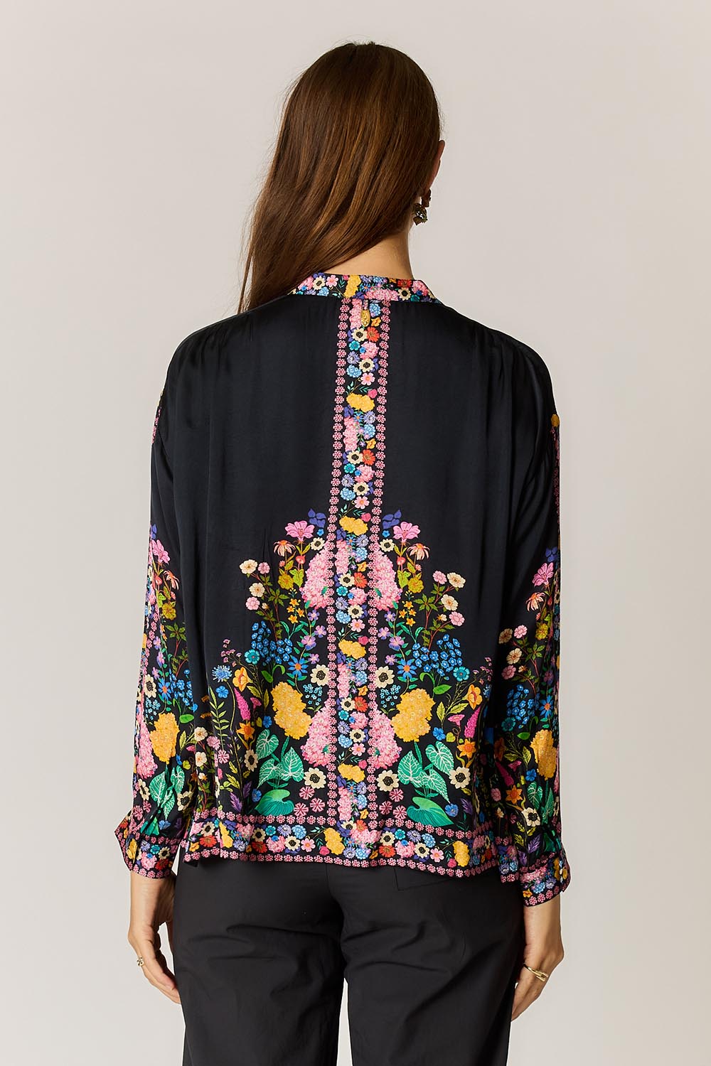 Model Genericm wearing size sample of the Delicia Shirt – Black in colour Black, from the back