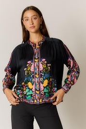 Model Genericm wearing size sample of the Delicia Shirt – Black in colour Black, in a cropped view