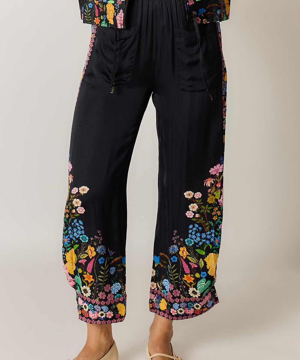 Model Genericm wearing size sample of the Delicia Pant – Black in colour Black, from the front