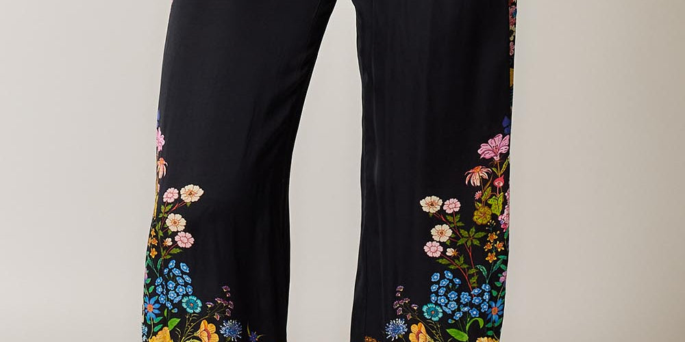 Model Genericm wearing size sample of the Delicia Pant – Black in colour Black, from the front