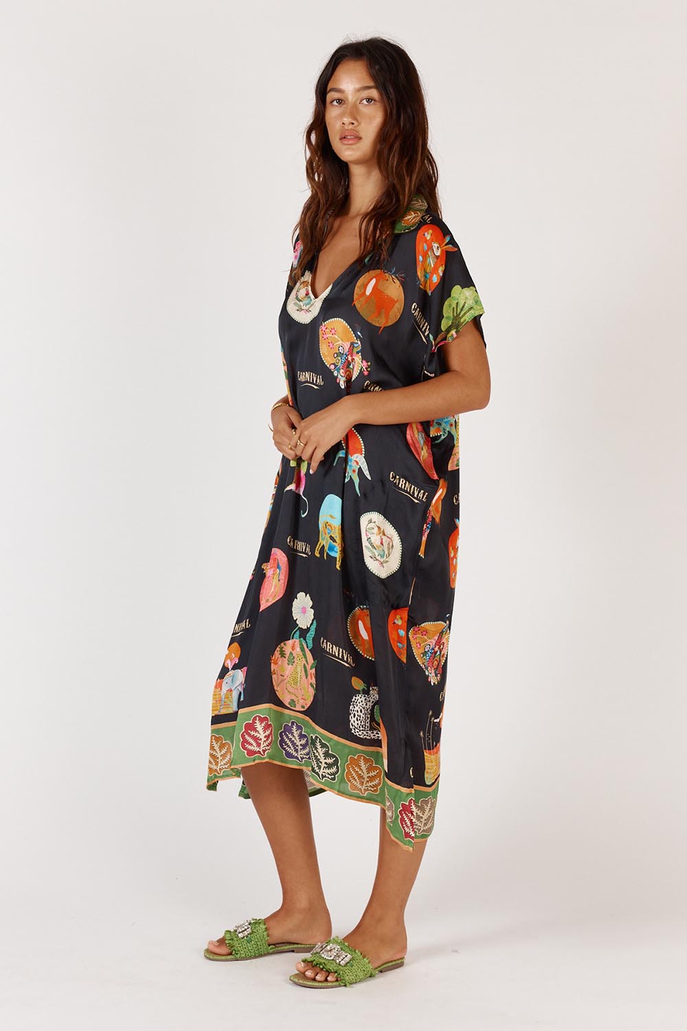A model wearing the Down Under Kaftan in colour Black (Black), from the front, showing the whole outfit