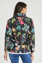 Model Madeline wearing size S of the Evergreen Puffer in colour Black (Black), from the back