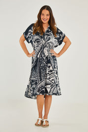 Model Georgia wearing size S of the Georgia Dress in colour Navy (Blue), from the front, showing the whole outfit