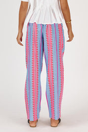 A model wearing the Ithaca Cotton Blend Pant in colour Neon, from the back