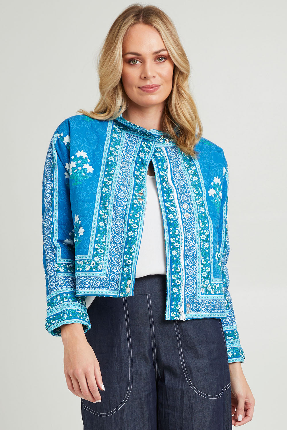 Model Grace wearing size S of the Kiana Jacket in colour Blue (Blue), from the front, cropped image