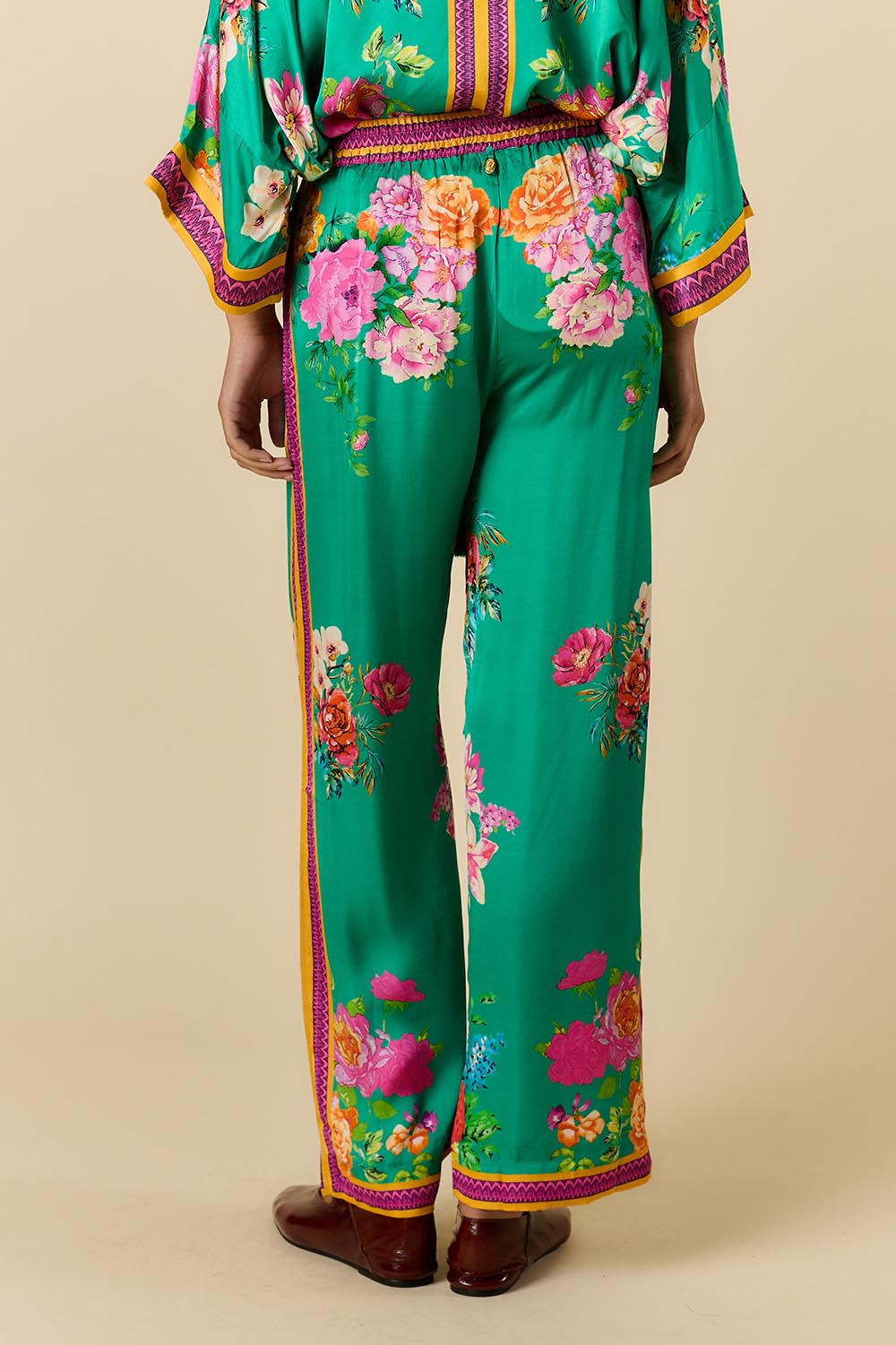 Model Genericm wearing size sample of the Liberte Pant – Green in colour Green, from the front