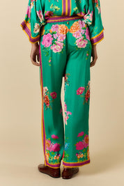 Model Genericm wearing size sample of the Liberte Pant – Green in colour Green, from the front