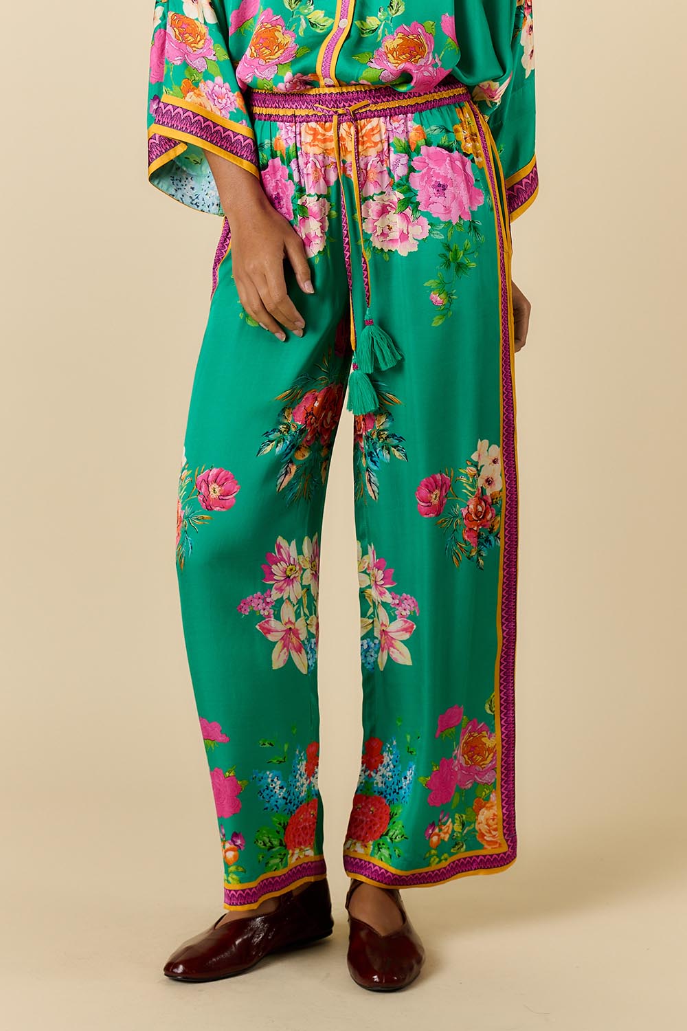 Model Genericm wearing size sample of the Liberte Pant – Green in colour Green, from the front