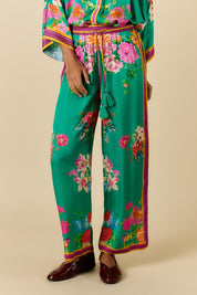 Model Genericm wearing size sample of the Liberte Pant – Green in colour Green, from the front