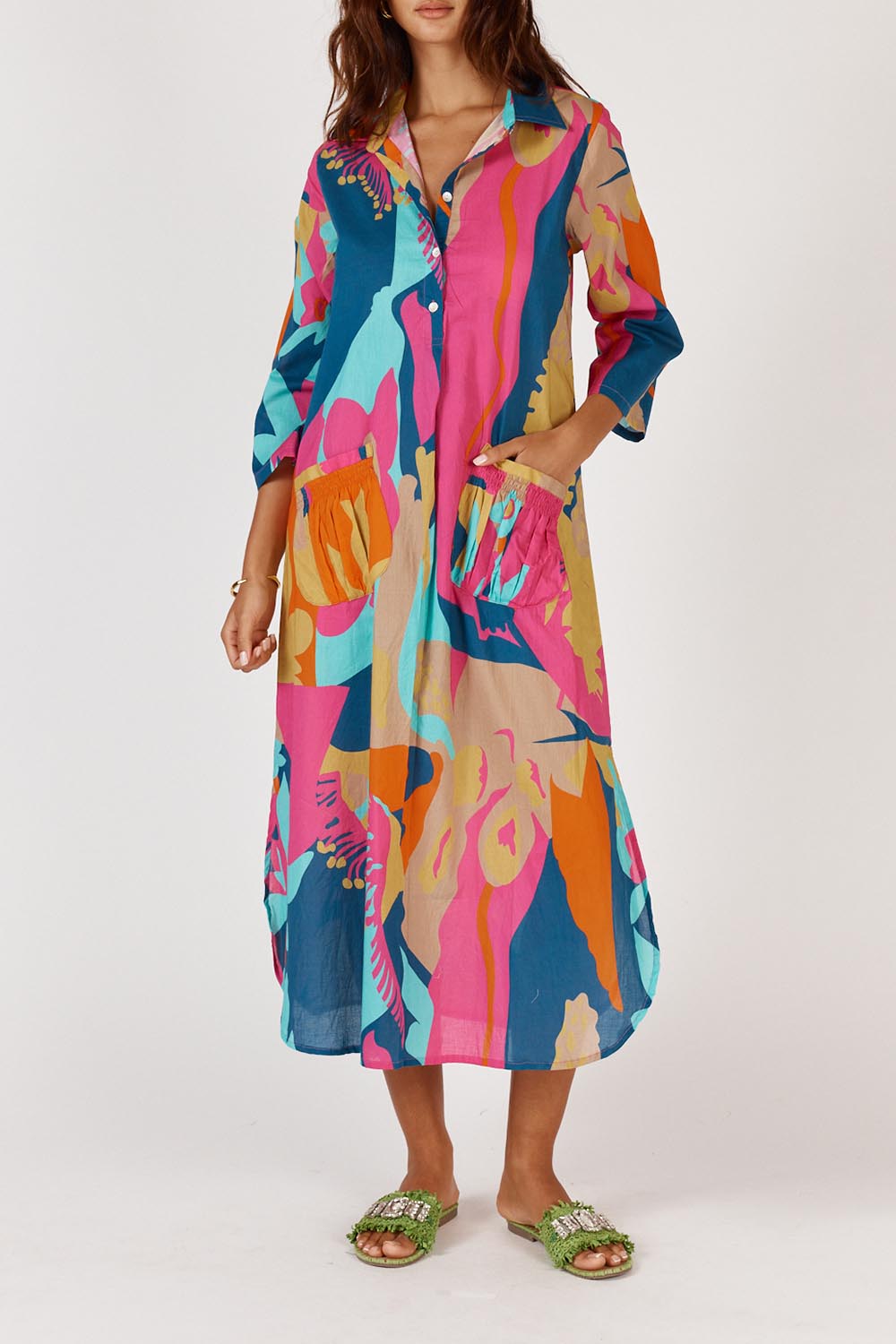 A model wearing the Lotus Bloom Cotton Midi Dress in colour Print, from the front, cropped image