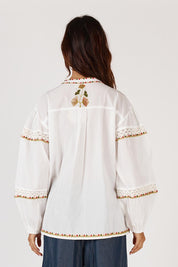 A model wearing the Monfils Cotton Top in colour White (White), from the back