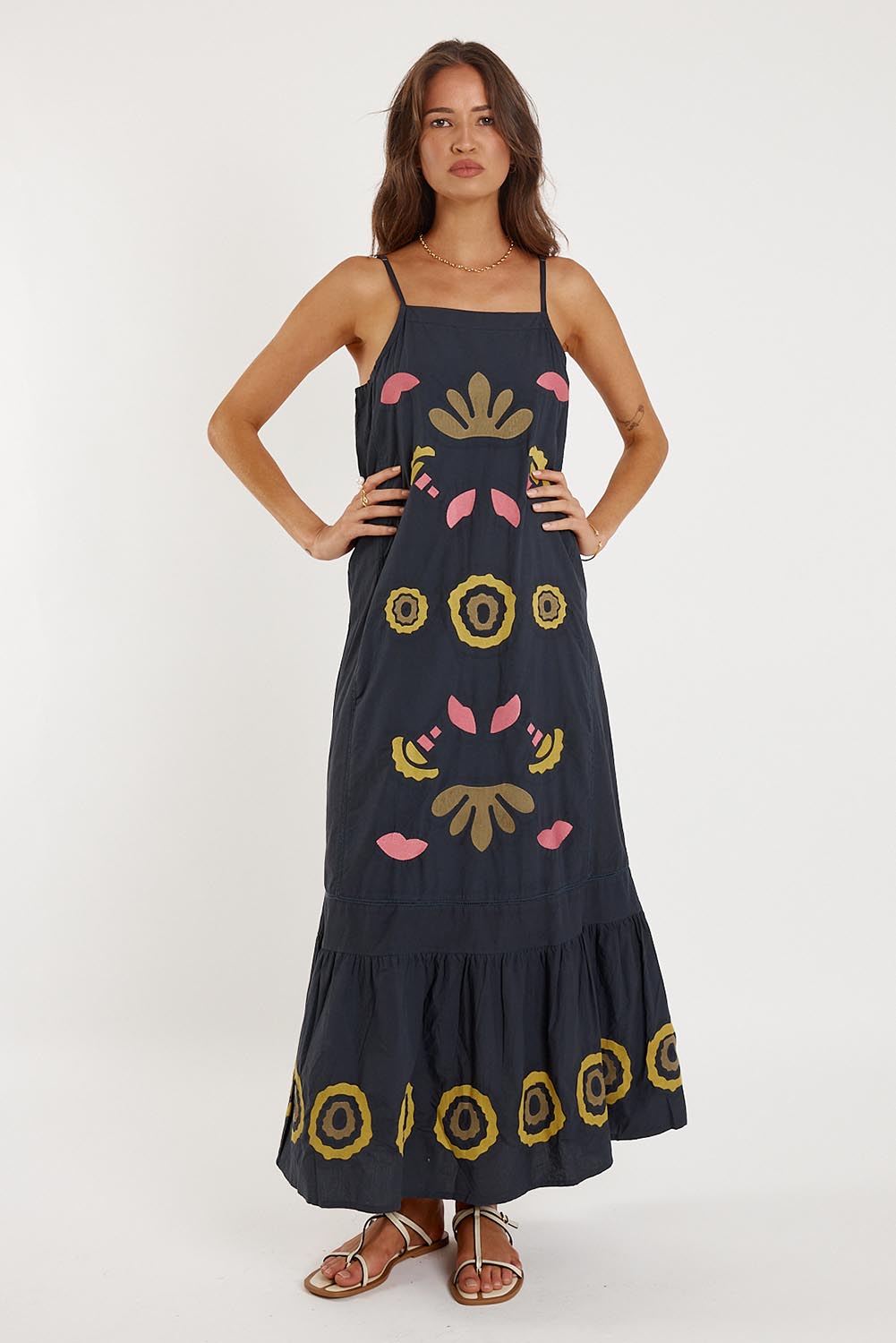 A model wearing the Monoki Cotton Dress in colour Black (Black), from the front, showing the whole outfit