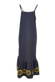 Product shot of the Monoki Cotton Dress in colour Black (Black), from the back