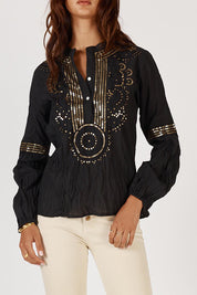 A model wearing the Moonshine Cotton Shirt in colour Black (Black), from the front, cropped image