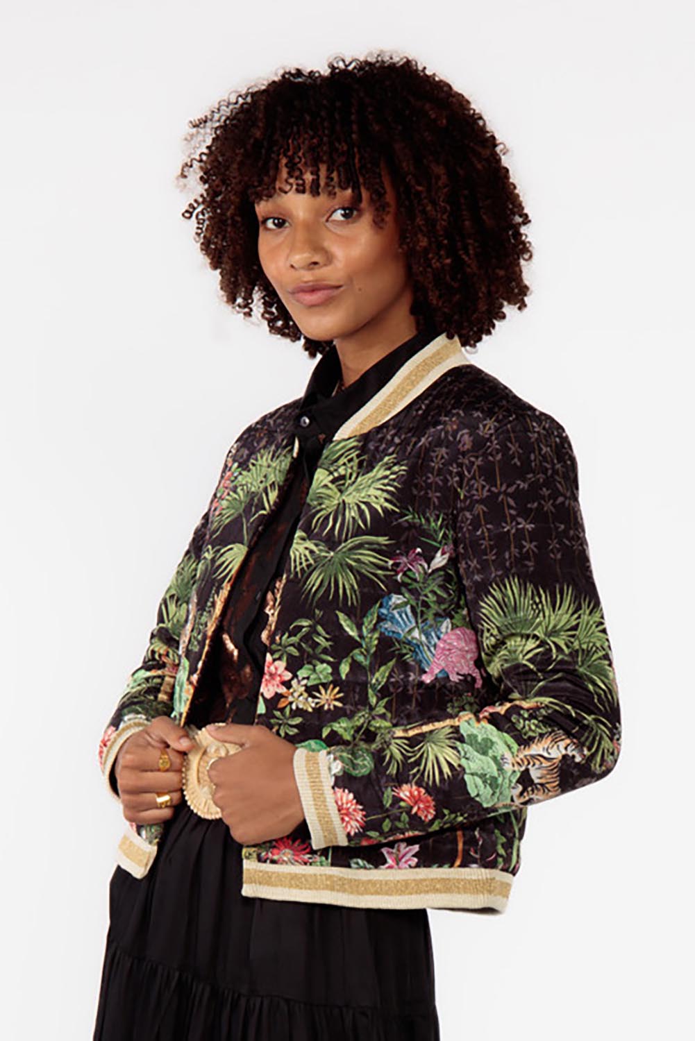 A model wearing the Nouveau Quilted Jacket in colour Black (Black), from the front, cropped image