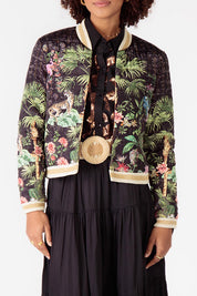 A model wearing the Nouveau Quilted Jacket in colour Black (Black), from the front, cropped image