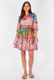 A model wearing the Ohana Cotton Dress in colour Pink (Pink), from the front, showing the whole outfit