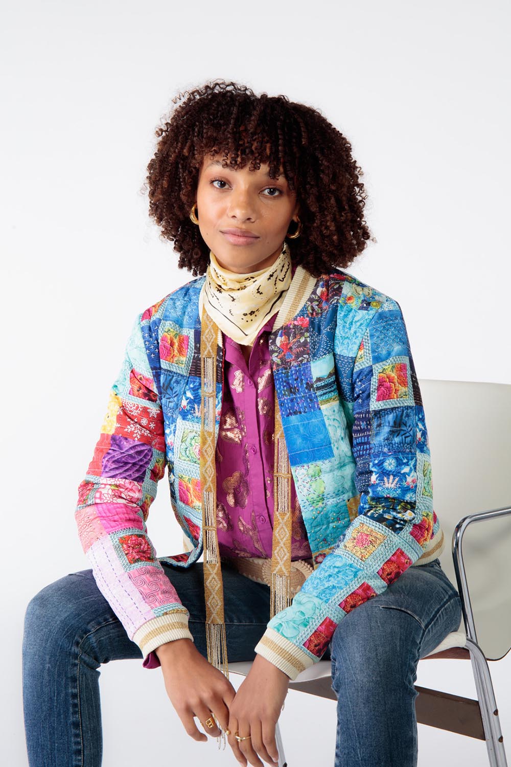 A model wearing the Oklahoma Quilted Jacket in colour Multi (Blue), from the front, cropped image