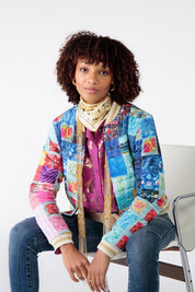 A model wearing the Oklahoma Quilted Jacket in colour Multi (Blue), from the front, cropped image